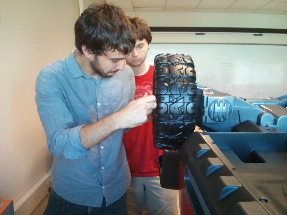 Club members Alex Linton (CS '14) and Albert Morlan (CS '16) worked together on the remote control power wheels car which would later be known as Buzzmobile.